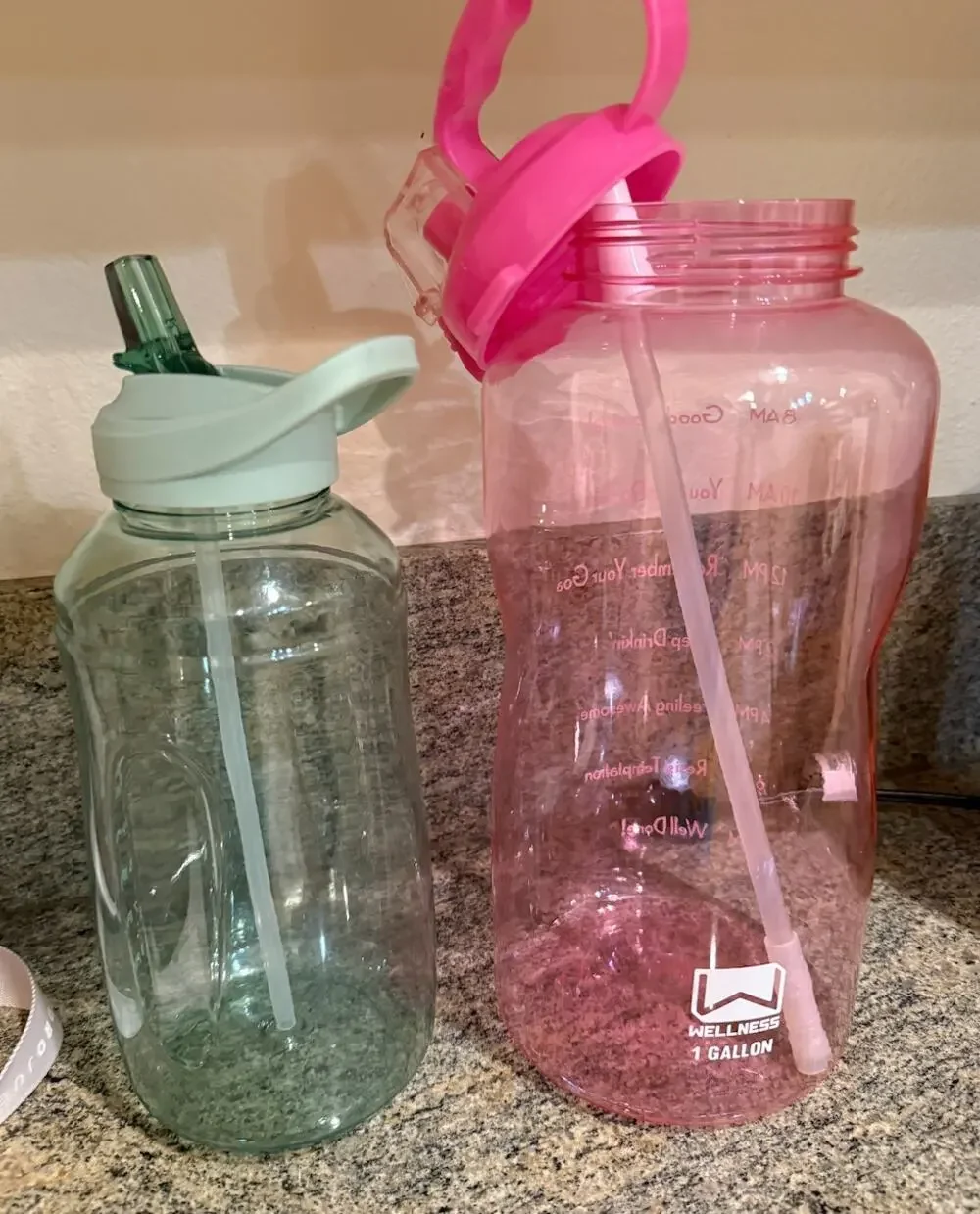 1 Gallon Pink Water bottle and 1 Liter Green Water Bottle